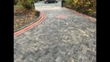 Charcoal Paved Driveway with Terracotta Borders and Patterns in Holywell,  Flintshire
