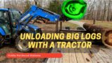 How to Safely Unload Big Sawmill Logs (With a Tractor)