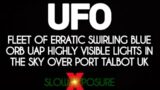 UFO – Fleet of erratic swirling blue orb UAP highly visible lights in the sky over Port Talbot UK