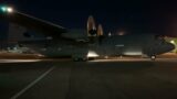 C-130J Hercules backing up to park at night at the CWHM.