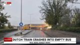 Dutch train crashes into empty bus
