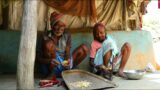 How Santali Tribe Old Couple Cooking BANANA FLOWER recipe and eating with hot rice |