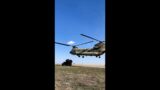 Pop Quiz: How does this Chinook get this equipment moved?