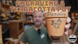 Engraving a terracotta pot
