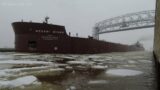 More Ice level View! The Mesabi Miner Departing Duluth, changing the direction of the ice flow!