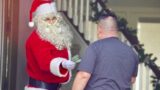 Santa Surprises Strangers With Cash!