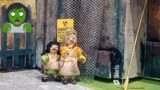 Zombies shot down with machine guns, relax they are just miniature dolls really.