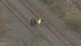 Man's body found next to railroad tracks in Houston area