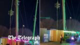 Moment boys are left dangling in mid-air after Winter Wonderland slingshot ride snapped