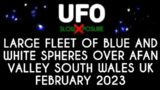 UFO – Huge fleet of blue and white spheres traverse the sky over Baglan South Wales UK February 2023