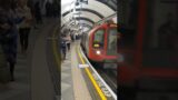 Underground train going fast around a curve