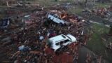 EF-4 tornado tears though Mississippi, National Weather Service says; at least 25 killed