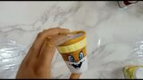 Painting baby looney toons on terracotta tea cups