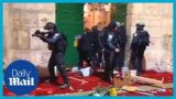 Israeli police clash a SECOND time with Palestinians in Al-Aqsa