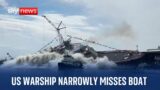 US Navy warship narrowly misses tugboat during launch