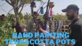 Hand painting Terracotta pots