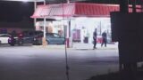Man shot, another grazed by a bullet after drive-by shooting outside store