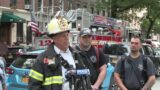FDNY officials provide an update on an all-hands fire and roof rope rescue in Brooklyn