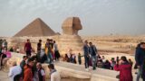 People near great sphinx and great pyramid of giza in egypt