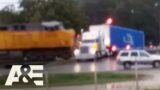Semi-Truck Stuck on Tracks Get SMASHED by Speeding Train | Road Wars | A&E