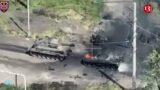 Coming to the rescue of a hit Russian tank, military equipment itself comes under artillery fire