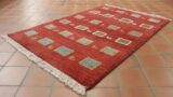 Persian Gabbeh rug with a terracotta background and square panel designs -tr309009