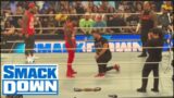 Roman Reigns delivers a Low Blow to Jey Uso during WWE Smackdown 7/7/23