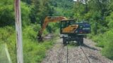 Hi Rail Excavator Ditching along the Tracks