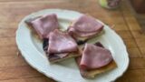 Mortadella on Pizza Crust from my Outdoor Oven World Market Blue Terracotta Fish