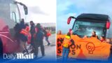Just Stop Oil mob accuse driver of coach carrying migrants of 'trying to kill ' them during protest