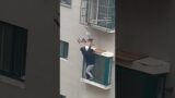 Neighbours rescue boy dangling from 4th-floor window in China #ytshorts