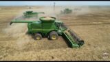 Wheat Harvest near Burlington Oklahoma with 4 John Deere S series combines.
