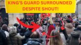 Armed Officer Comes To The Rescue Of King’s Guard Amidst Chaos