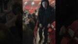 Dave Mustaine sneaks into seats behind fans secretly handing kids guitar picks