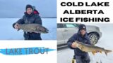 Ice Fishing Cold Lake for Lake Trout