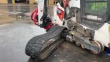 Skid steer track change in minutes! Roto-Tilt to the Rescue