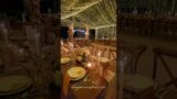 The reception dinner in terracotta hues under fairy lights at Shanti Villa.