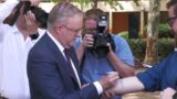‘Get it tattooed on’: Prime Minister signs GST promise on journalist’s arm