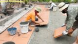 Construction And Installation Of Red Terracotta Tiles For A Complete Outdoor Playground