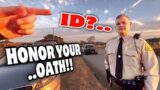 Dumb Cops Get OWNED By A Man Holding A Sign