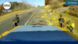 Worker narrowly avoids being hit by truck on New York highway