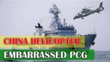 A Chinese military helicopter hovers over PCG ship in West Philippine Sea